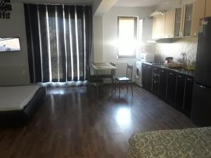 Kuchyň nebo kuchyňský kout v ubytování Aquazure Residence