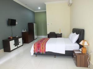 GLOBAL VIEW HOTEL客房内的一张或多张床位