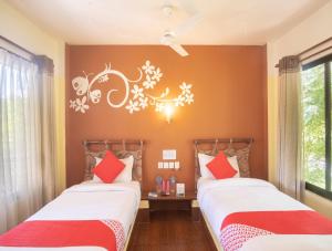 Chitwan Riverside Resort客房内的一张或多张床位