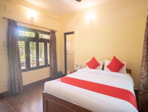 Chitwan Riverside Resort客房内的一张或多张床位