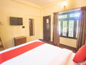 Chitwan Riverside Resort客房内的一张或多张床位