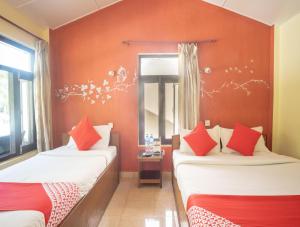 Chitwan Riverside Resort客房内的一张或多张床位