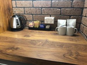 Coffee and tea-making facilities at Cessnock Vintage Motor Inn