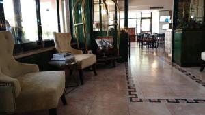 A seating area at Hotel Cristallo Relais, Sure Hotel Collection By Best Western