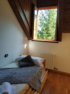 Ένα ή περισσότερα κρεβάτια σε δωμάτιο στο Inmocyma Casa Estrac