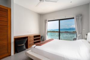 Un ou plusieurs lits dans un hébergement de l'établissement 2 Bedroom Seaview Villa Plai Laem B1 SDV203-By Samui Dream Villas