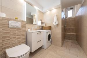 Kúpeľňa v ubytovaní Apartments Luky
