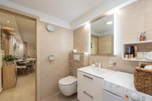 Kúpeľňa v ubytovaní Apartments Luky + 30 fotografií