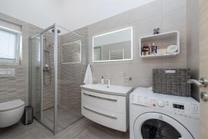Kúpeľňa v ubytovaní Apartments Luky