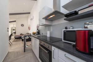 Kuchyňa alebo kuchynka v ubytovaní Apartments Luky
