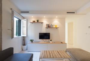 Fotografia z galérie ubytovania Gran apartamento en el centro histórico con parking gratuito 4 habitaciones por KEYWISE v destinácii Málaga