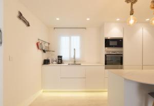 Fotografia z galérie ubytovania Gran apartamento en el centro histórico con parking gratuito 4 habitaciones por KEYWISE v destinácii Málaga