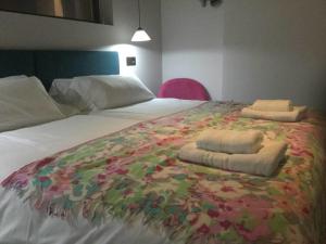 Posteľ alebo postele v izbe v ubytovaní Apartamentos RG Dúplex San Bernardo