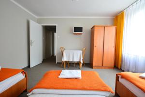 Postel nebo postele na pokoji v ubytování Hotel Felix
