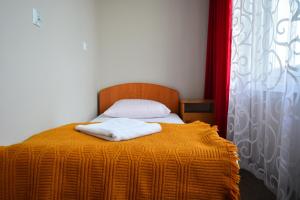 Postel nebo postele na pokoji v ubytování Hotel Felix