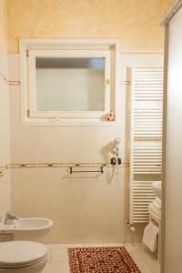 Koupelna v ubytování Anfiteatro B&B + 28 fotografií