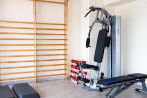 a room with a gym with a treadmill at Eurostars Don Cándido in Terrassa