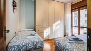 Postel nebo postele na pokoji v ubytování Villa Dervio