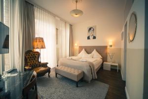 Postel nebo postele na pokoji v ubytování MAISON MARSIL - Boutique Hotel Köln