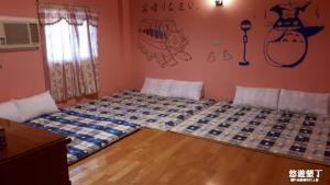 Ένα ή περισσότερα κρεβάτια σε δωμάτιο στο Pthles Guest house