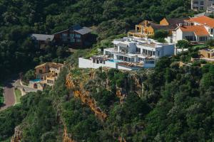 a house on the side of a mountain at Head over Hills in Knysna