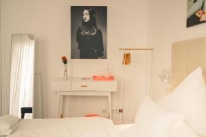 Postel nebo postele na pokoji v ubytování MAISON MARSIL - Boutique Hotel Köln