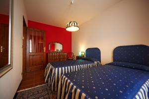 A bed or beds in a room at Felicin - Dimora del Centro