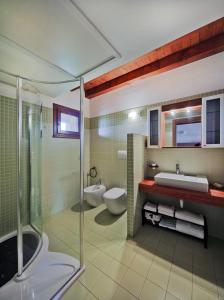 Et badeværelse på Il Milione Country Hotel
