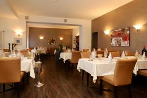 ห้องอาหารหรือที่รับประทานอาหารของ Hotel Arancio