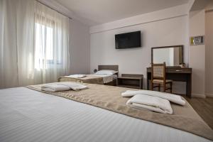 Ein Bett oder Betten in einem Zimmer der Unterkunft Airport House