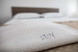 Ein Bett oder Betten in einem Zimmer der Unterkunft Airport House