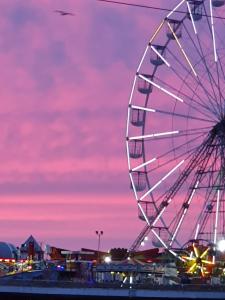 a ferris wheel at a carnival at sunset at Tobermory Hotel in Blackpool