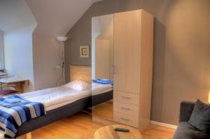 Voodi või voodid majutusasutuse Hotel Vännäs toas