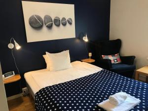 Letto o letti in una camera di Port Hotel