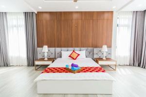 Ένα ή περισσότερα κρεβάτια σε δωμάτιο στο Rio 3 homestay +17 φωτογραφίες