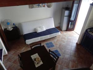 Postel nebo postele na pokoji v ubytování Rustico San Leonardo