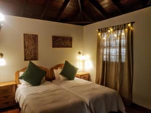 Un pat sau paturi într-o cameră la Casas rurales LAS TIAS I