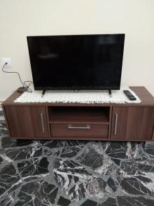 A television and/or entertainment centre at Paraskevi's House