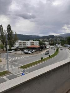 a view of a city street with cars on the road at Basto Vila Hotel in Cabeceiras de Basto