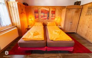 Letto o letti in una camera di Pension Chesselberg