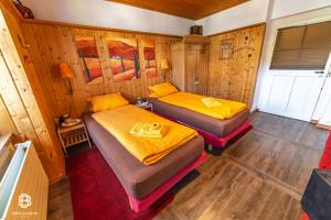Letto o letti in una camera di Pension Chesselberg