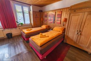 Letto o letti in una camera di Pension Chesselberg