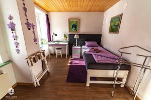 Letto o letti in una camera di Pension Chesselberg