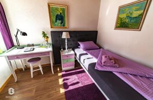 Letto o letti in una camera di Pension Chesselberg