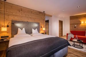 Voodi või voodid majutusasutuse Hotel Tipotsch toas