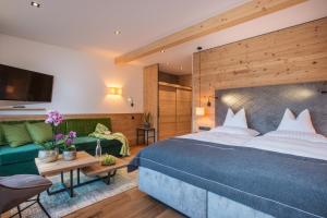 Voodi või voodid majutusasutuse Hotel Tipotsch toas