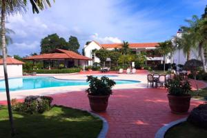 Fotografie z fotogalerie ubytování Los Corozos Apartment G1 Guavaberry Golf & Country Club v destinaci Juan Dolio