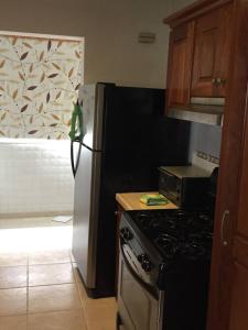 Fotografie z fotogalerie ubytování Los Corozos Apartment G1 Guavaberry Golf & Country Club v destinaci Juan Dolio