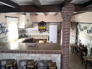 Kuchyň nebo kuchyňský kout v ubytování Villa Hierbabuena