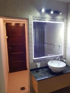 a bathroom with a sink and a large mirror at Casa San Román in La Rioja +26 photos